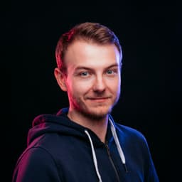 Headshot of Krzysztof Huszcza